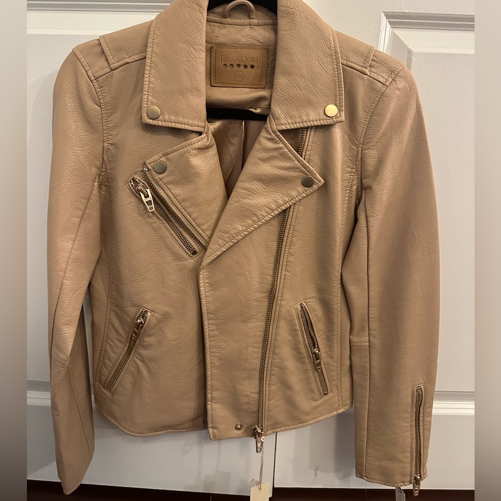 Blank NYC Faux Leather Moto Jacket. Never worn and new with tags. Size XS